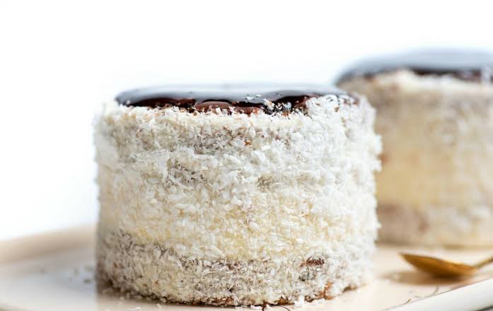 Coconut-covered Russian Hat pastry with chocolate topping